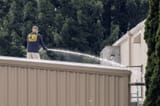fbi hosing off the roof