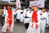 Iraqi Shiites flagellate themselves in Karbala as they mark the anniversary of the death of Imam Hussein