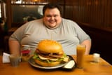 fat-man-with-a-huge-belly-is-sitting-at-a-table-in-a-cafe-with-a-huge-hamburger-ai-generative-photo