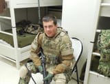 Buttigieg Combat Poseur