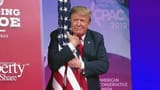 190305190954-trump-hugs-flag-large-169
