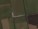 west of komar_thumb.jpg