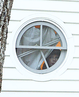 TaylorLookingOutHerYachtsWindow