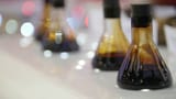 videoblocks-crude-oil-in-vial-on-exhibition_hyxbqsrtz_thumbnail-1080_01-3300439573
