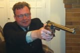 Jonathan Bowden about to clear about out some redditors with his british gun