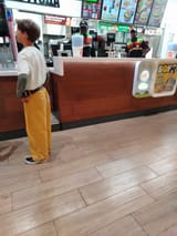Moscow 2024 Africa Nigger - Young boy stands in front of a counter at a fast food restaurant