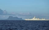 PLAN Type 055 destroyer Dailan escorting the PLAN aircraft carrier Fujian (not pictured) on it&#039;s first sea trials.