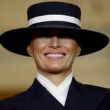 what is she hiding inside that hat