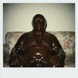 1750662561_imagen_a_man_made_of_gravy_orb._polaroid_photo_reality._1997_picture_album._2