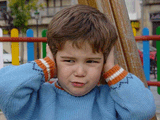 boy covering ears