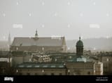 roofs-panorama-with-towers-of-the-poland-city-krakw-during-the-winter-day-with-grey-overcast-sky-2C53ETA