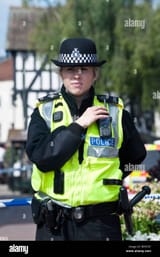 front-view-of-wpc-woman-police-officer-guarding-a-crime-scene-in-hereford-BPGT87