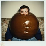 1750662561_imagen_a_man_made_of_gravy_orb._polaroid_photo_reality._1997_picture_album._3