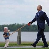 Putin walking Trump on a leash