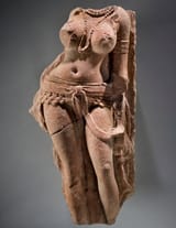 sculpture-of-a-female-figure-probably-a-yakshi-nature-v0-c44fldm1ijwd1
