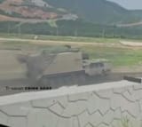 ammunition resupply vehicle for the SH-16 SPG with automated turrett