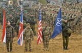 141113-A-QS211-509_-_Soldiers_of_the_1st_Brigade_Combat_Team,_1st_Cavalry_Division,_and_2nd_Cavalry_Regiment_participate_in_the_closing_ceremony_for_Iron_Sword_2014