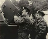 Hafez_al-Assad_inspects_armored_vehicle,_supplied_by_the_Soviet_Union,_during_the_October_War[1]