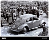 1930s-adolf-hitler-with-dr-ferdinand-porsche-at-the-launch-event-of-M23A3W