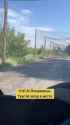 Ukrainian supply road to Pokrovsk. Several Russian FPV drones got stuck in an anti-drone net at the entrance road. 19-07-2025 HD_thumb.jpg