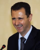 151022121252-assad-laugh
