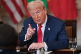 Trump_sitting_and_pointing[1]