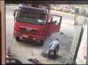 chinese man in china on a exploding tire_thumb.jpg