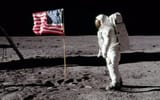 Apollo-11-astronaut-Buzz-Aldrin-stands-next-to-a-flag-on-the-moon-on-July-20-1969.-NASA-960x600