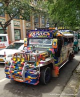 Colorful-jeepney-with-rainbow-grill-in-Cebu