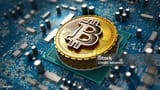 crypto-currency-blockchain-concept-with-coin-on-the-motherboard[1]