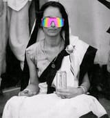 Savitri Devi with pit viper glasses and boomer juice white monster