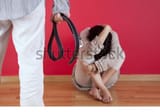 Beating His Wife with a Belt