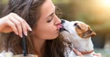 dog-licking-womans-face-001-tease-today-161024