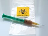 biohazard-specimen-bag-syringe-brown-liquid-clear-309413451
