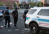 chicago-illinois-police-officers-detain-a-man-who-was-found-inside-of-a-best-buy-store-after