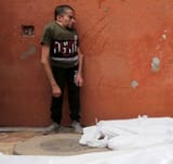Inbred Gazan Looking At his Brothers Corpse