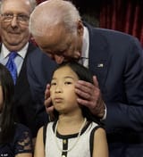 11788442-11318091-Vice_President_Joe_Biden_kisses_a_niece_of_incoming_Senate_Major-m-6_1665809716835