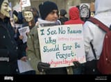 anonymous-protest-at-church-of-scientology-london-man-holds-poster-B1C3PF