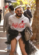 71091303-12097009-Todorovic_was_seen_with_his_legs_exposed_outside_Fashion_Week_wi-a-9_1684537017981