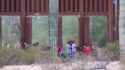 US Border Gates Open Mexicans Entering_thumb.jpg