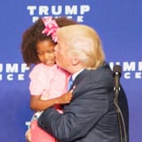 square-1476806484-trump-little-girl-kiss