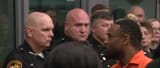 Man accused of killing deputy gestures to supporter at arraignment