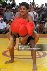 cambodians-compete-in-a-khmer-wrestling-match-during-the-pchum-ben-festival-the-festival-of-1541174373