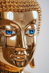 close-up-golden-statue-buddha-blue-eyes-vesak-asalha-puja-close-up-golden-statue-buddha-blue-eyes-369564023