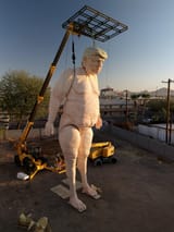 close-up-of-the-giant-naked-donald-trump-statue-v0-plmsppmh9rsd1
