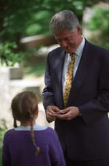 President_Bill_Clinton_receives_a_young_girl_