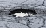 A-POTHOLE-CAN-DAMAGE-YOUR-VEHICLE-YOUR-PASSENGERS-AND-YOU