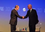 Vladimir_Putin,_Klaus_Schwab_-_World_Economic_Forum_Russia_CEO_Roundtable_2007