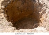 deep-hole-dug-ground-funeral-260nw-2018326973