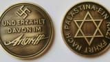 Coin - A commemorative medal struck by Nazi Germany to mark its Zionist alliance, with a Star-of-David on one side and a Swastika on the obverse.
